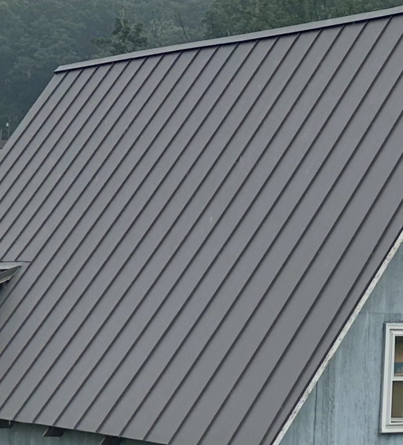 gray metal roof installed by Eclipse Construction